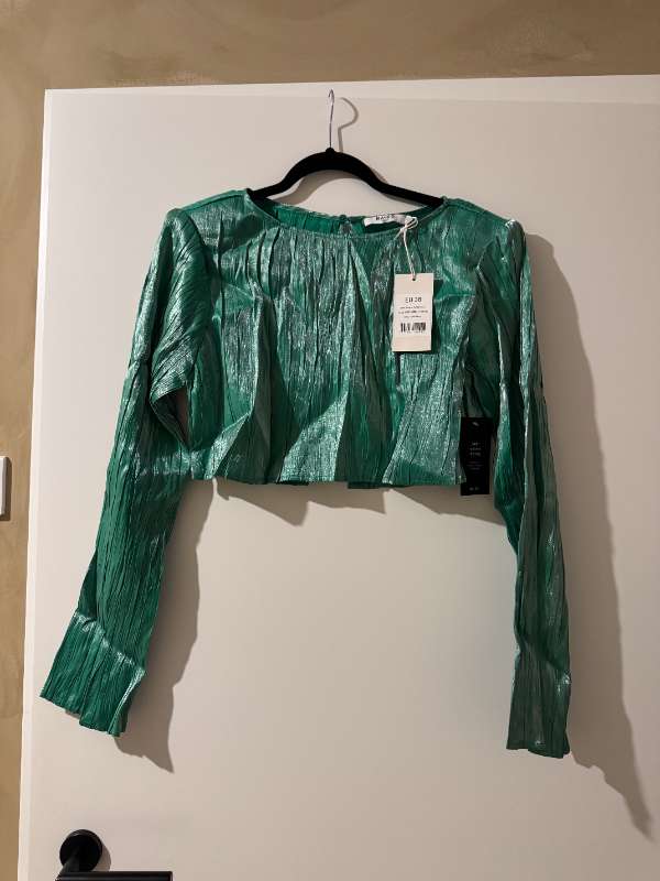 Nak-d toppur með verðmiða á