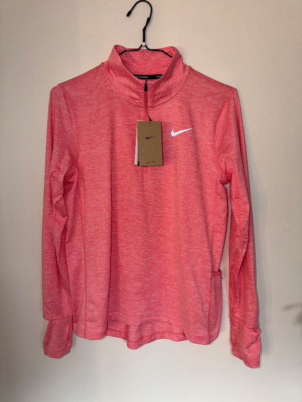Bleik Nike hálfrennd peysa