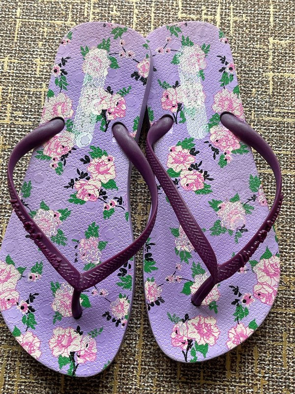 Purple flip flops