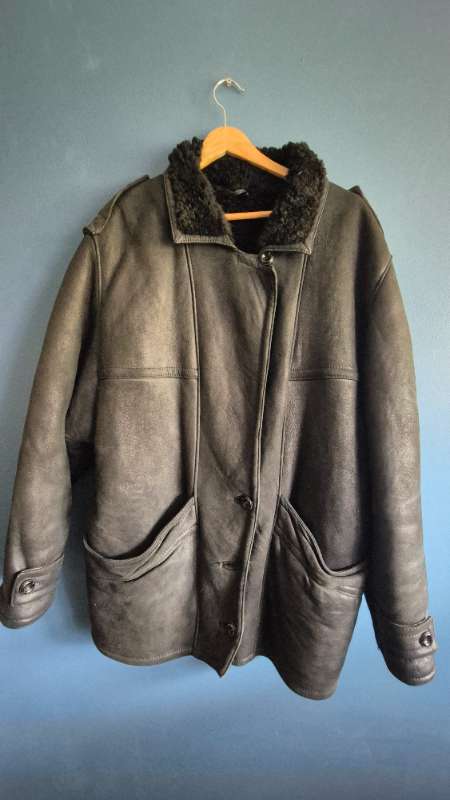 Black sheepskin jacket (one button is missing)