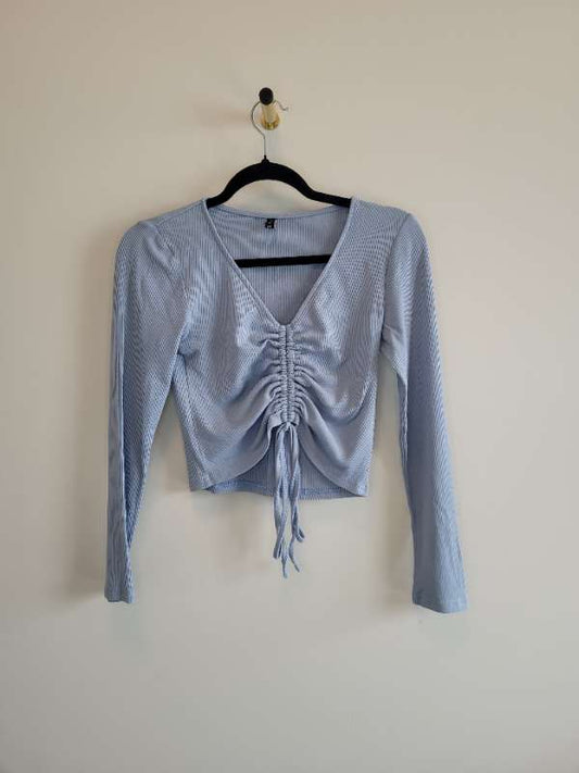 Light blue top