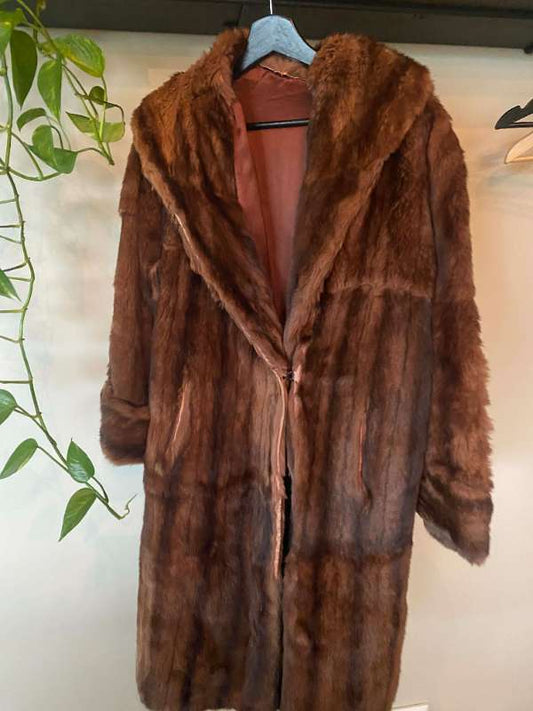 ATH Slitinn sést á honum, Vintage pels