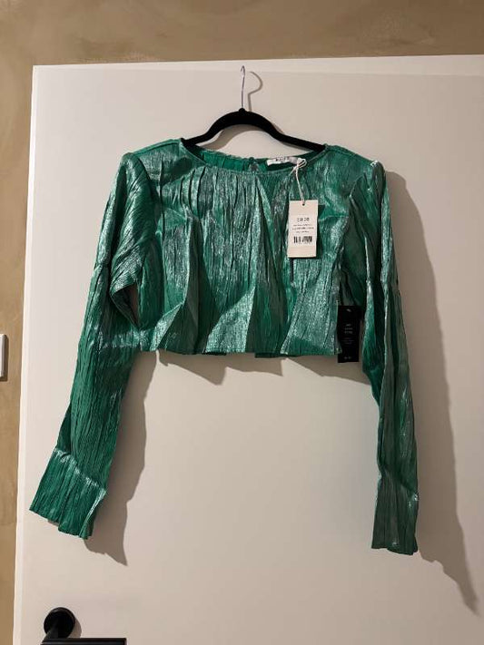 Nak-d toppur með verðmiða á