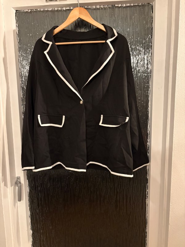 Black jacket with white stripes