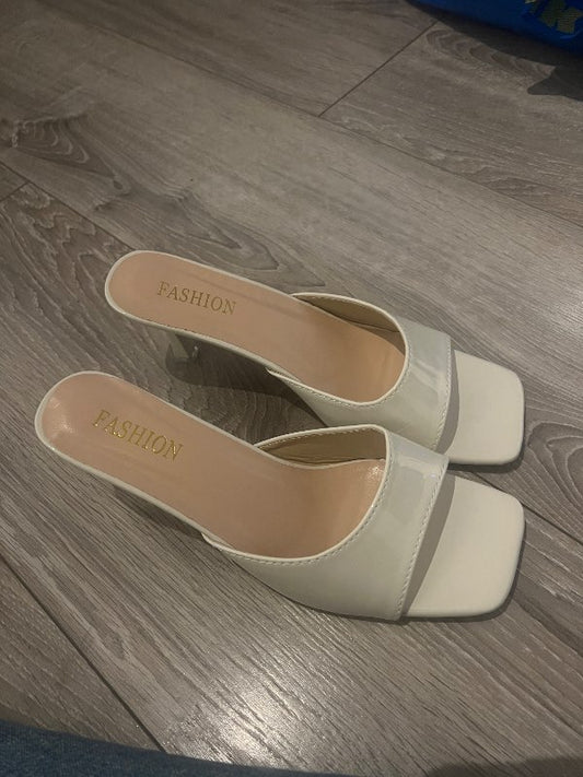 White heels, unused