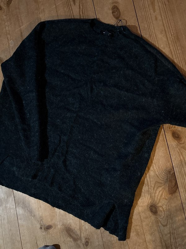 Dark green sweater