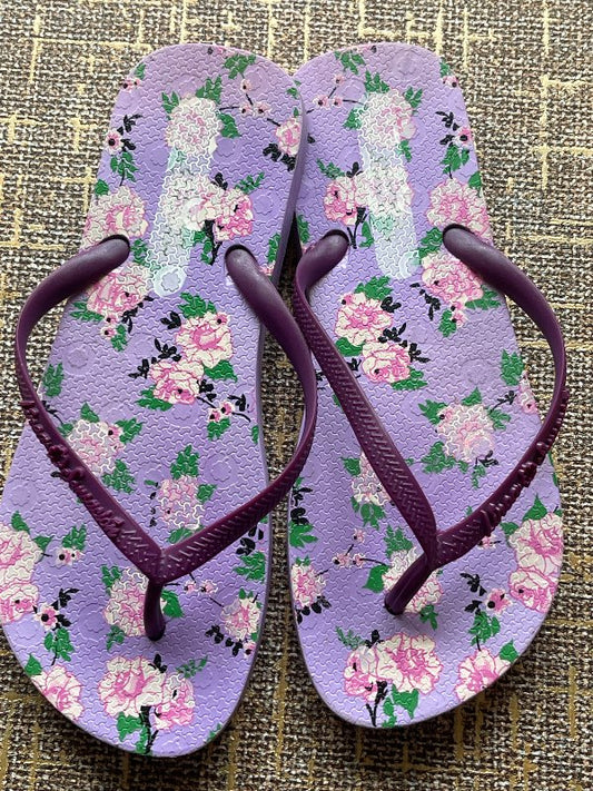 Purple flip flops