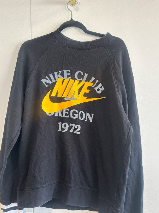 Svört/gul Nike peysa