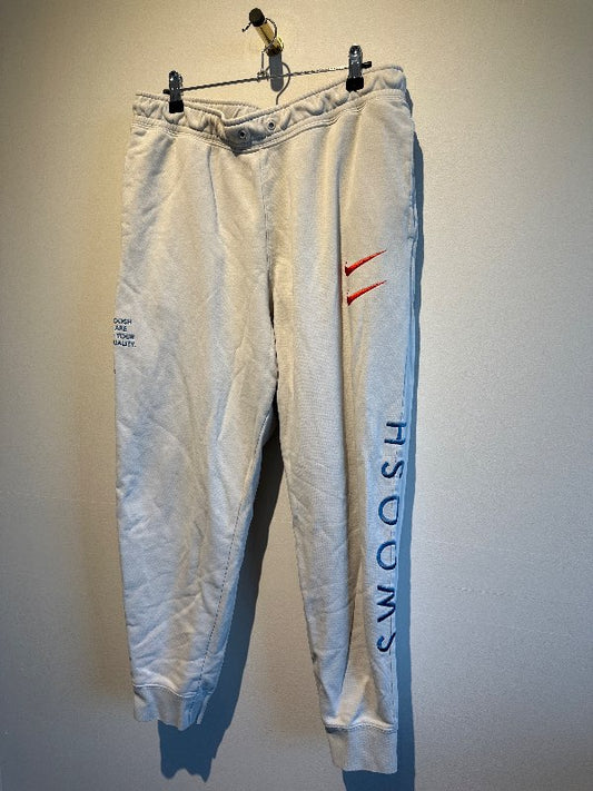 Nike swoosh pants