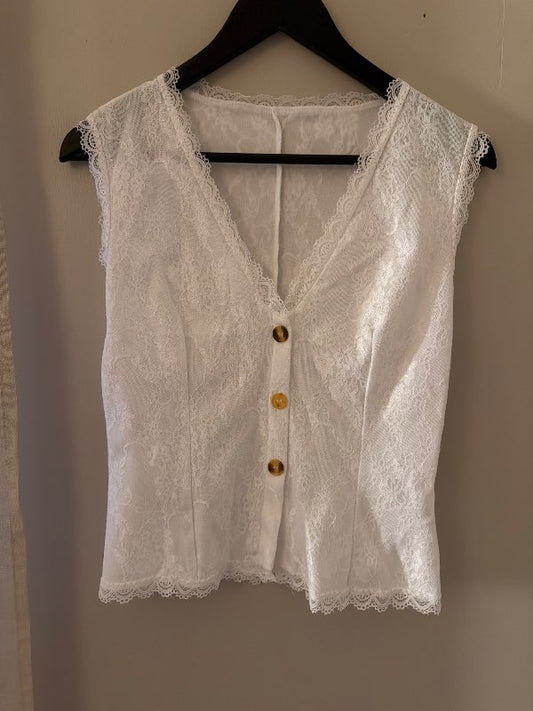 H&M vesti hvítt